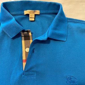 Men's Medium royal blue Burberry Brit polo shirt.